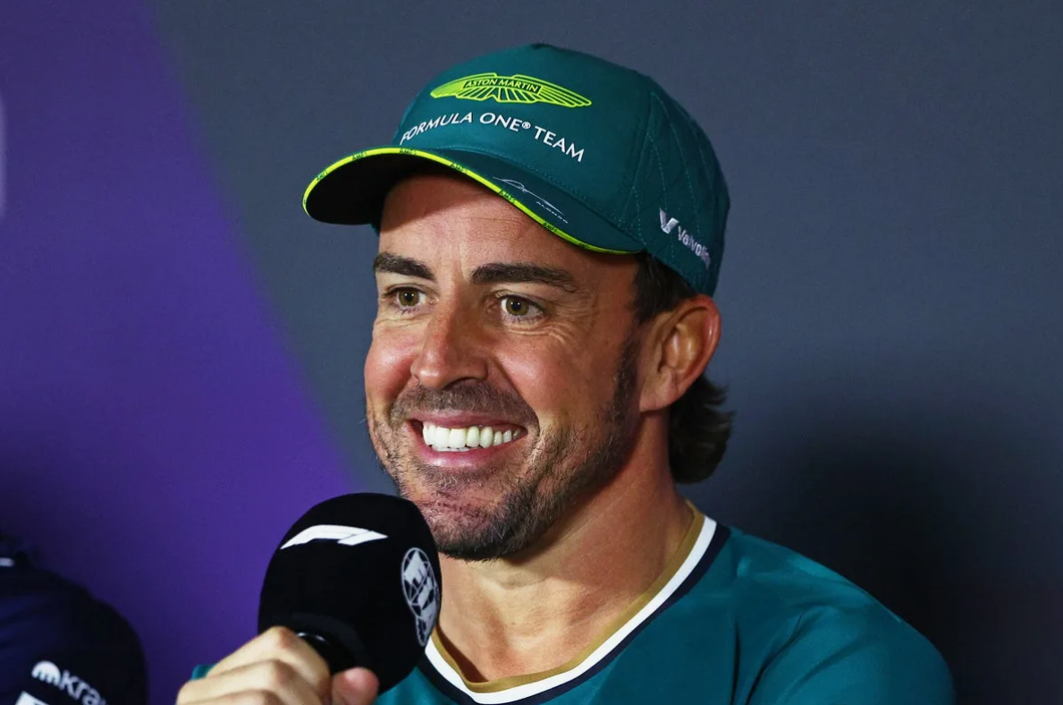 Fernando Alonso racing at high speed during a Formula 1 event