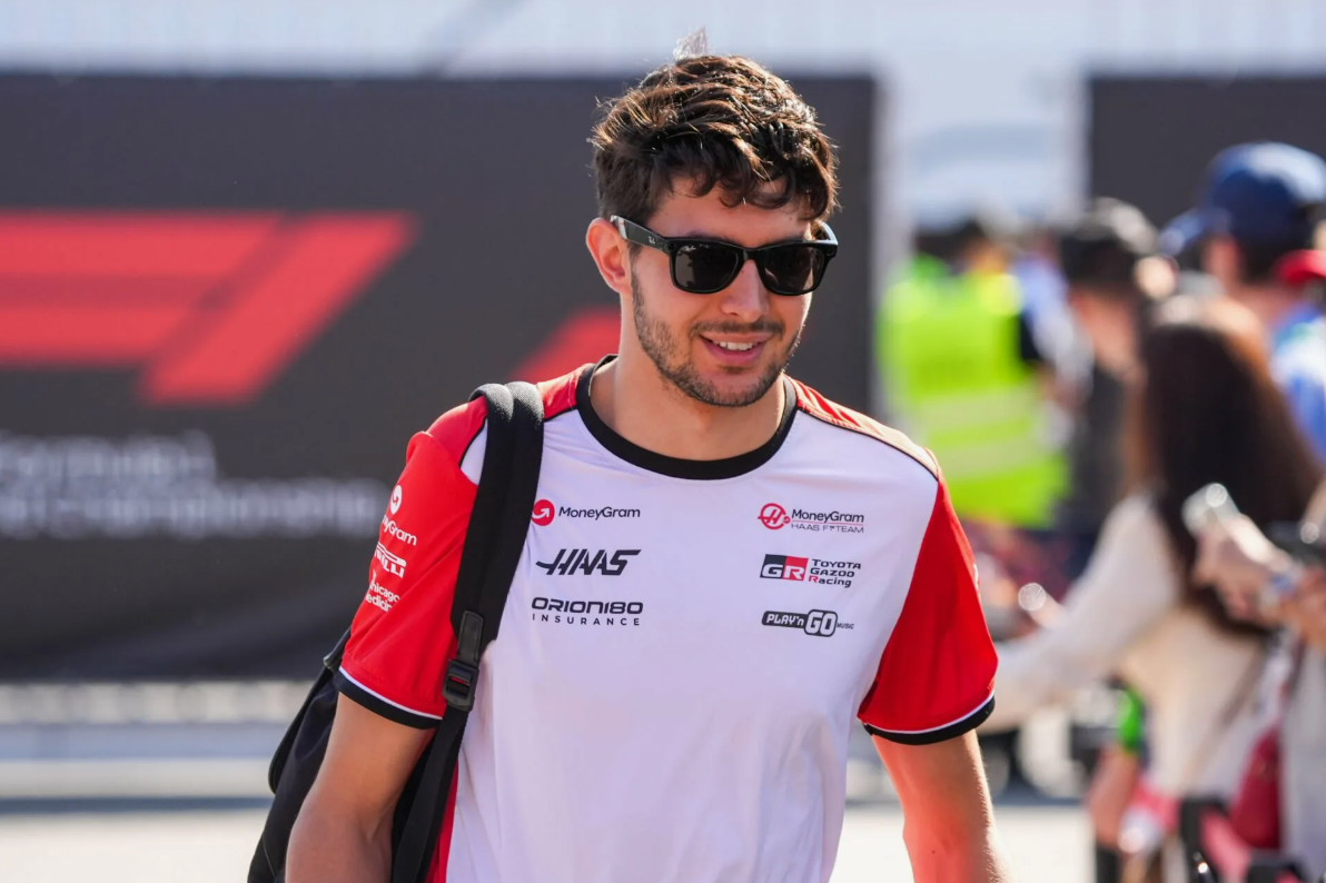 Haas F1 car racing on track during competitive lap