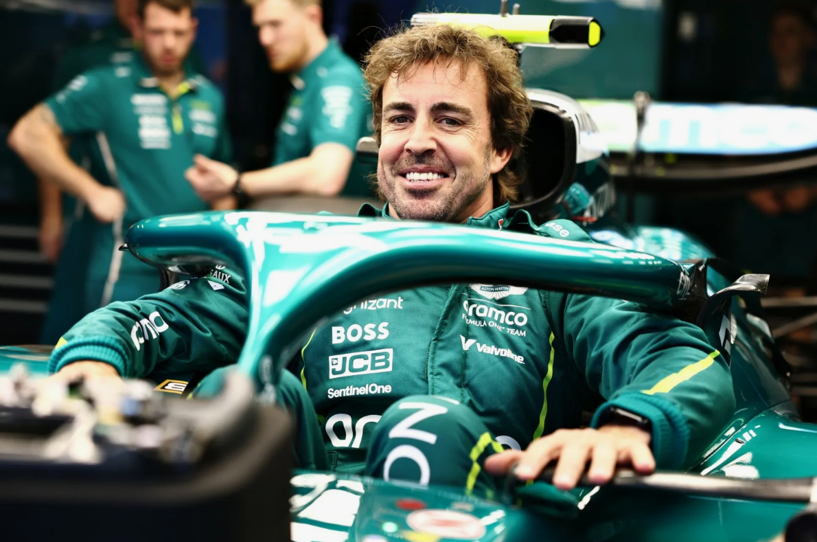Aston Martin Formula 1 car racing on track during a Grand Prix weekend