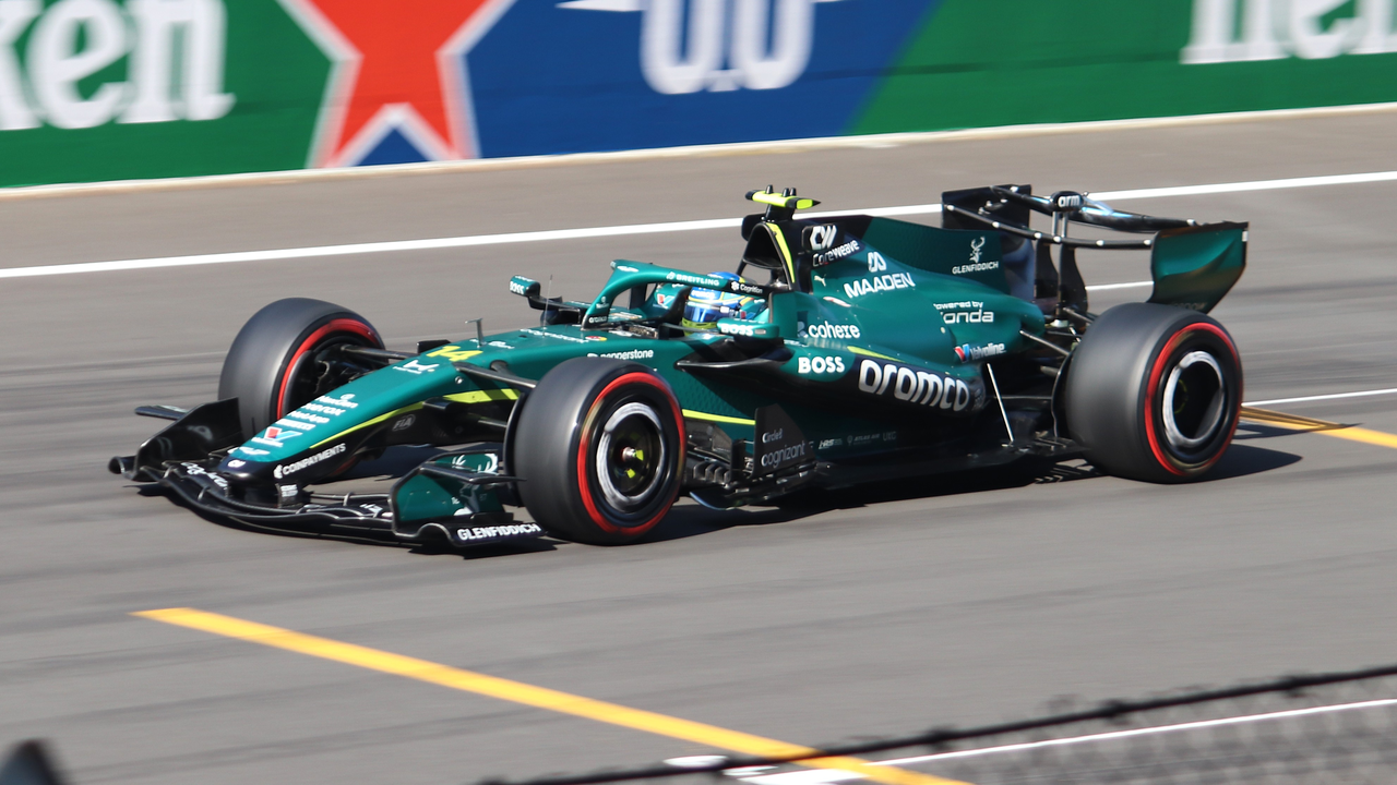 Fernando Alonso racing for Aston Martin