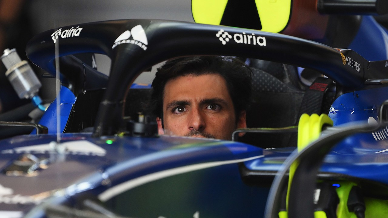 Carlos Sainz sits inside the Williams cockpit