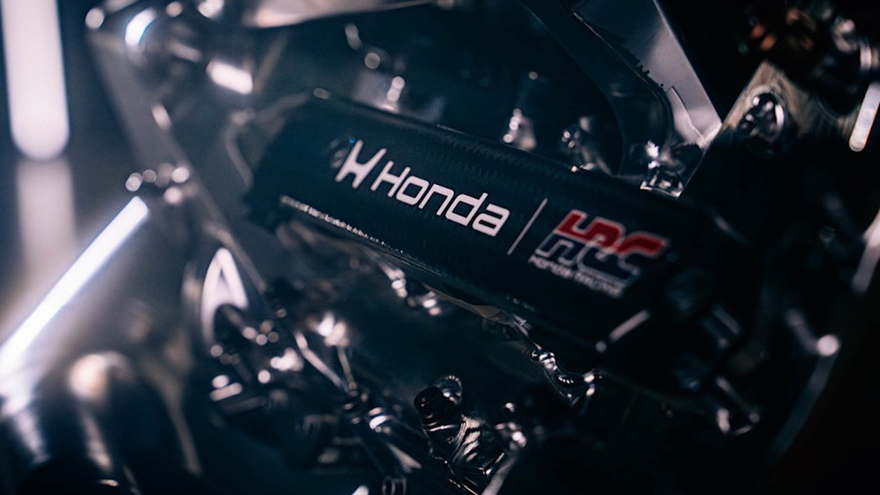 The Honda HRC Formula 1 power unit is shown under workshop lighting
