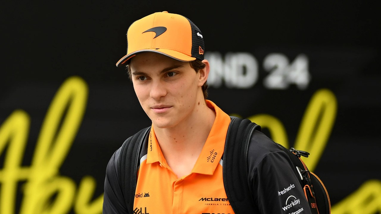 Oscar Piastri stands in McLaren Formula 1 clothing