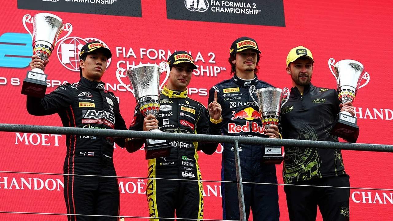 Formula 2 drivers stand on the podium at Spa
