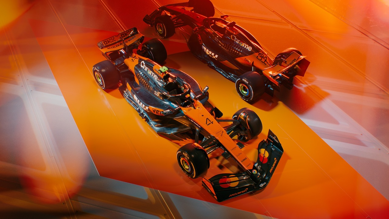 A McLaren Formula 1 car runs on the circuit