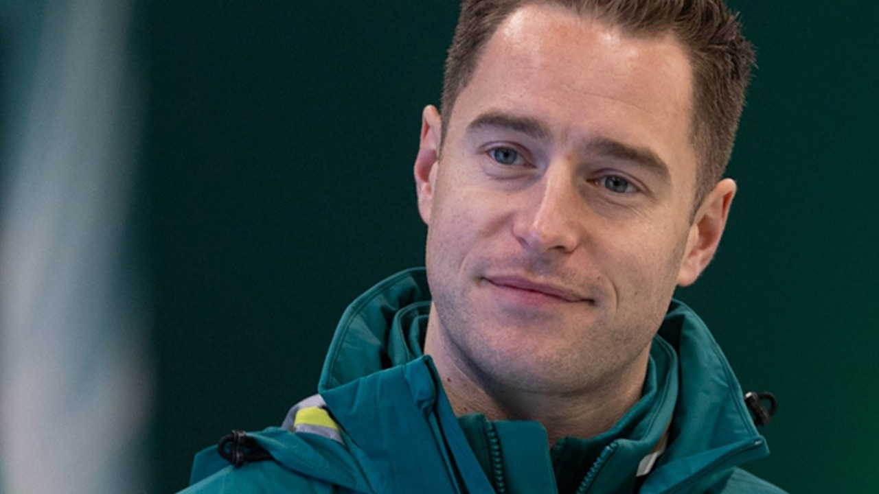 Stoffel Vandoorne wears Aston Martin team clothing