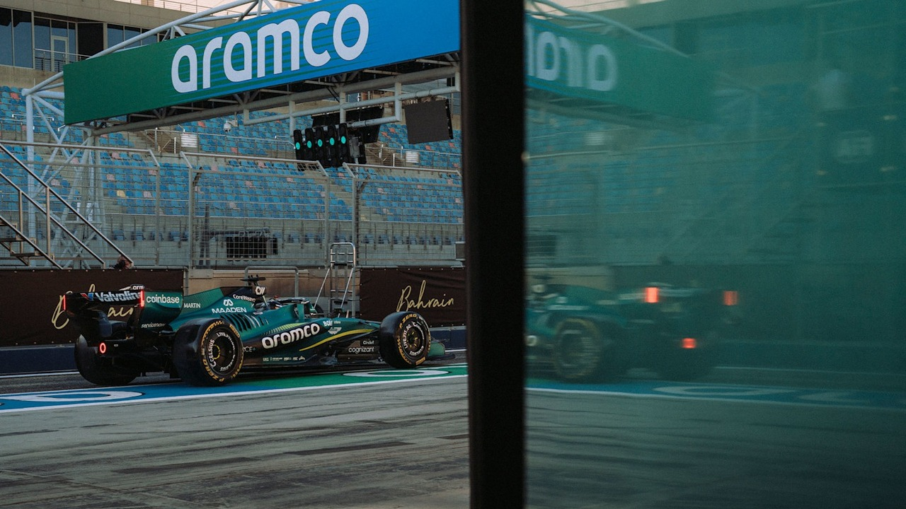 An Aston Martin Formula 1 car runs on track
