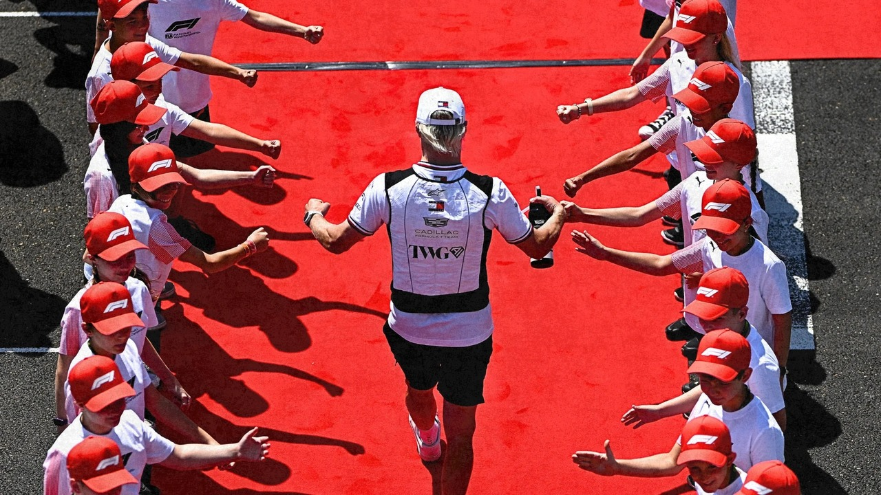 Valtteri Bottas walks through the Formula 1 paddock