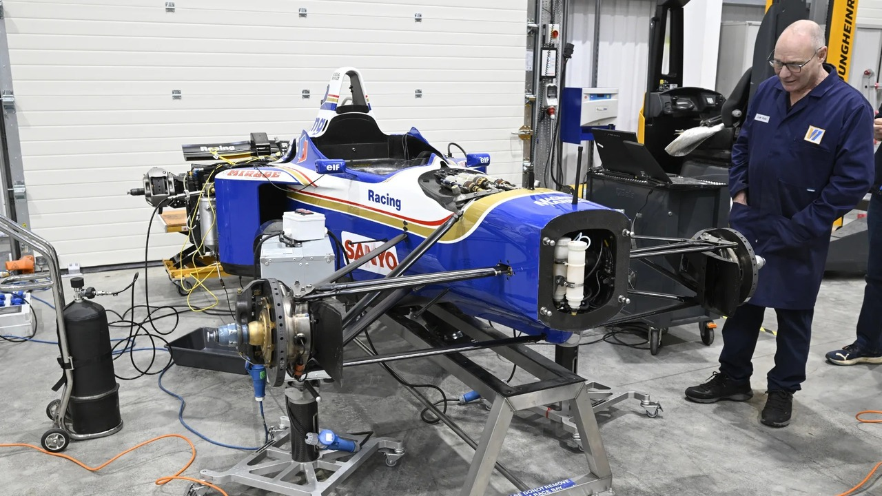The Williams FW18 is prepared inside a workshop